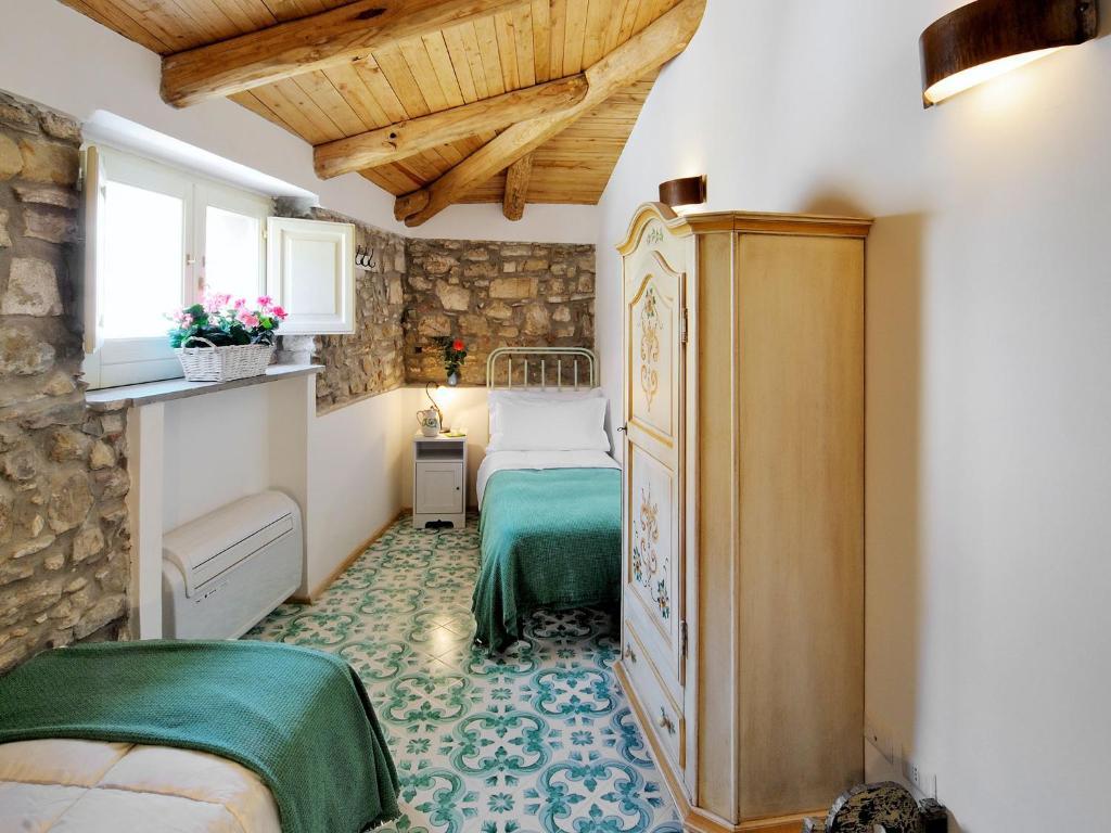 Residenza Matarazzo E Le Sue Soffitte Apartment กัสเตลลาบาเต ห้อง รูปภาพ